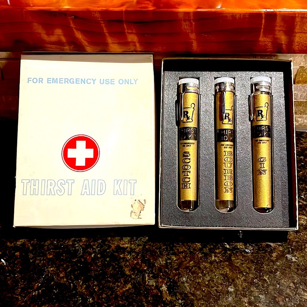 Vintage collectible Thirst Aid Kit- Glass tubes marked scotch, Bourbon, Gin